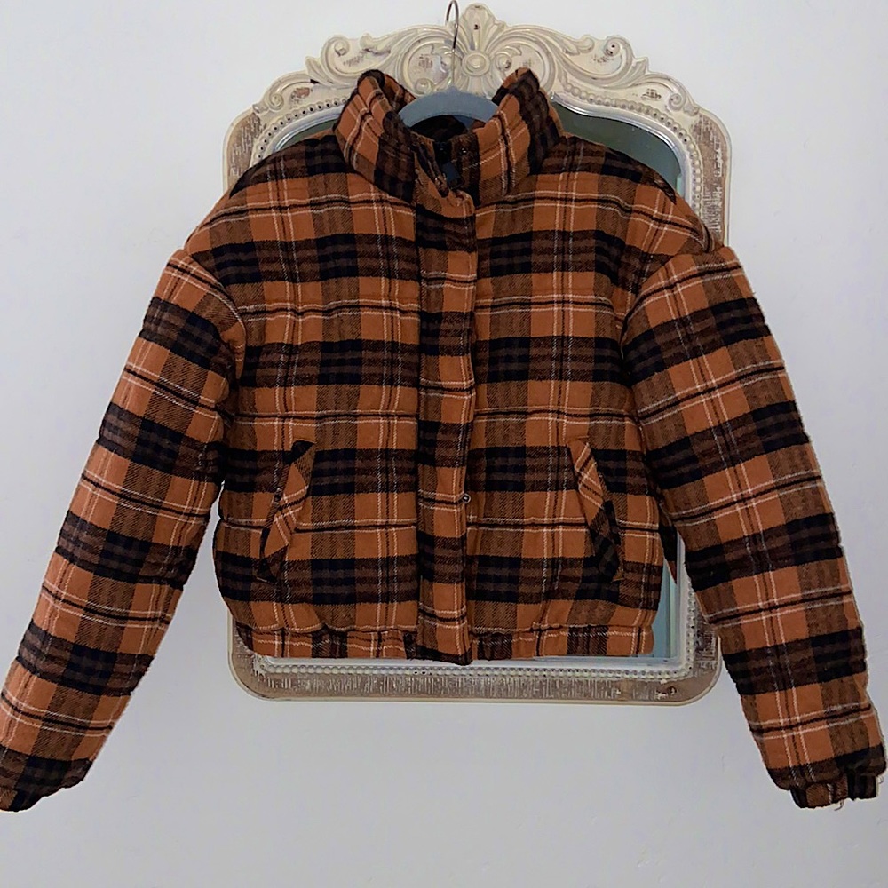 This is an Orange and Black plaid puffer, extremely warm and comfortable.